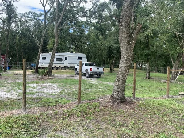 a childrens park with lots of swings and slides