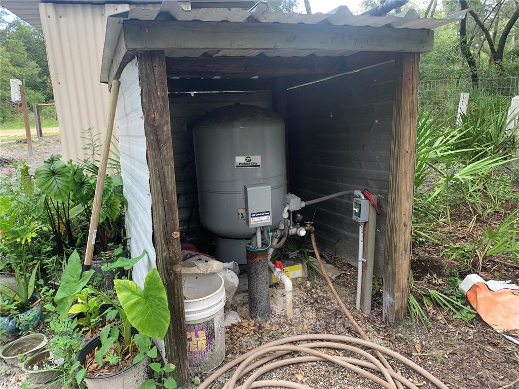 35314 Goethals Street Webster, FL 33597 - Photo 6 of 9 a house view with a outdoor space