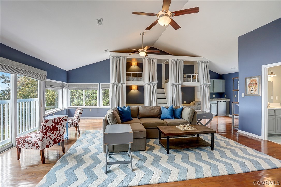 5149 Wakema Road West Point, VA 23181 - Photo 13 of 47 a living room with furniture and a large window