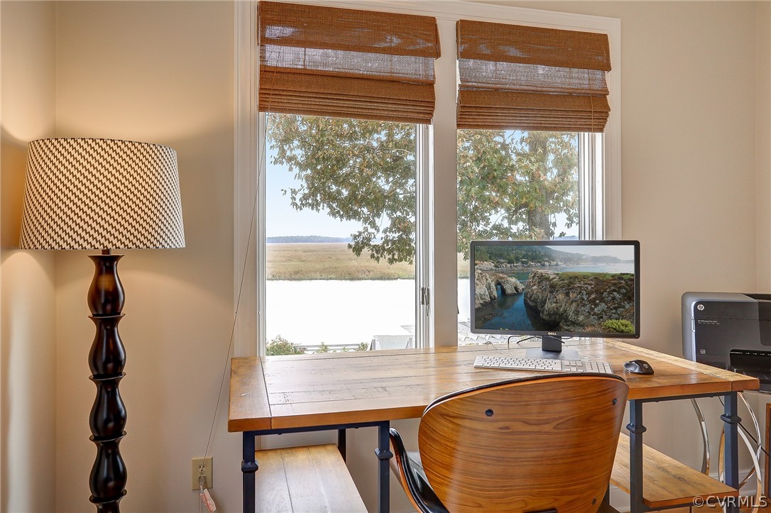 5149 Wakema Road West Point, VA 23181 - Photo 24 of 47 a view of a balcony with chair and table