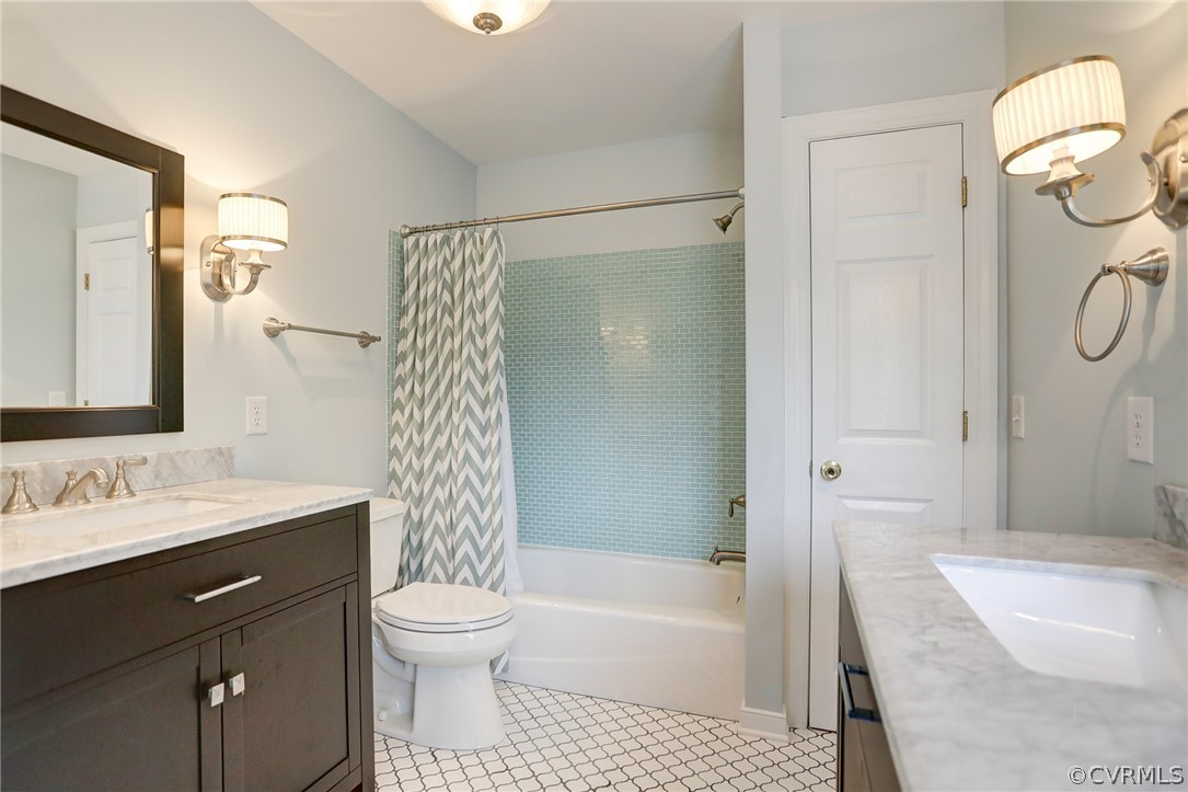 5149 Wakema Road West Point, VA 23181 - Photo 27 of 47 a bathroom with a sink a toilet and shower