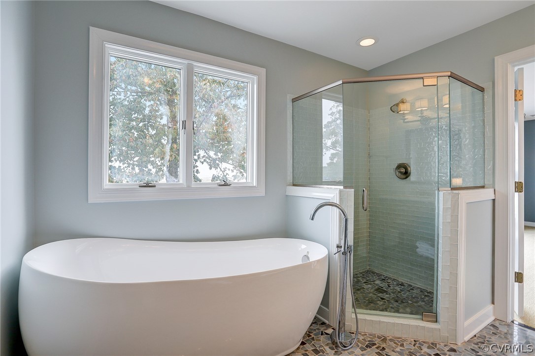 5149 Wakema Road West Point, VA 23181 - Photo 34 of 47 a white bath tub sitting in a bathroom next to a window
