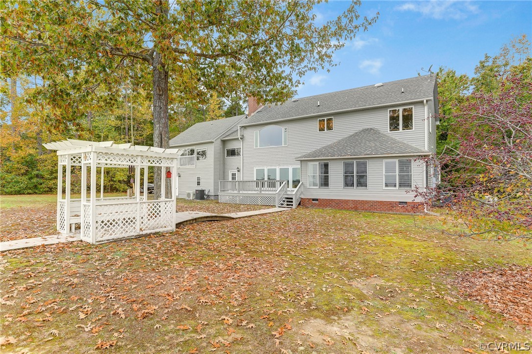 5149 Wakema Road West Point, VA 23181 - Photo 38 of 47 a front view of a house with a large tree