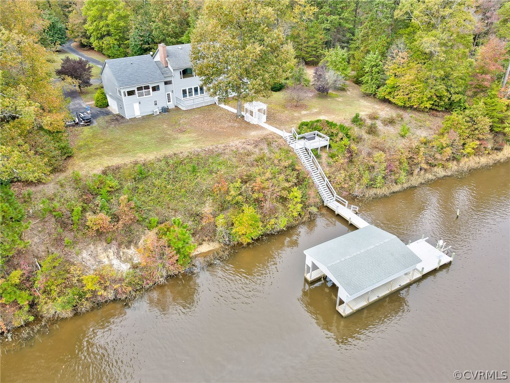 5149 Wakema Road West Point, VA 23181 - Photo 46 of 47 an aerial view of a house with a yard and lake view