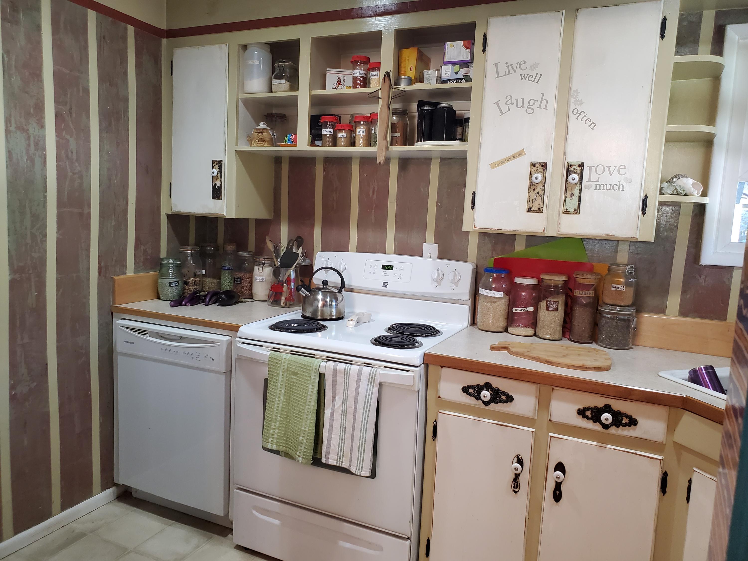 1032 Reddy Avenue Medford, OR 97504 - Photo 5 of 20 a view of a kitchen with fridge and wooden floor