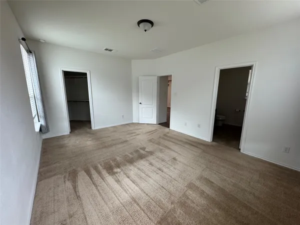 an empty room with windows