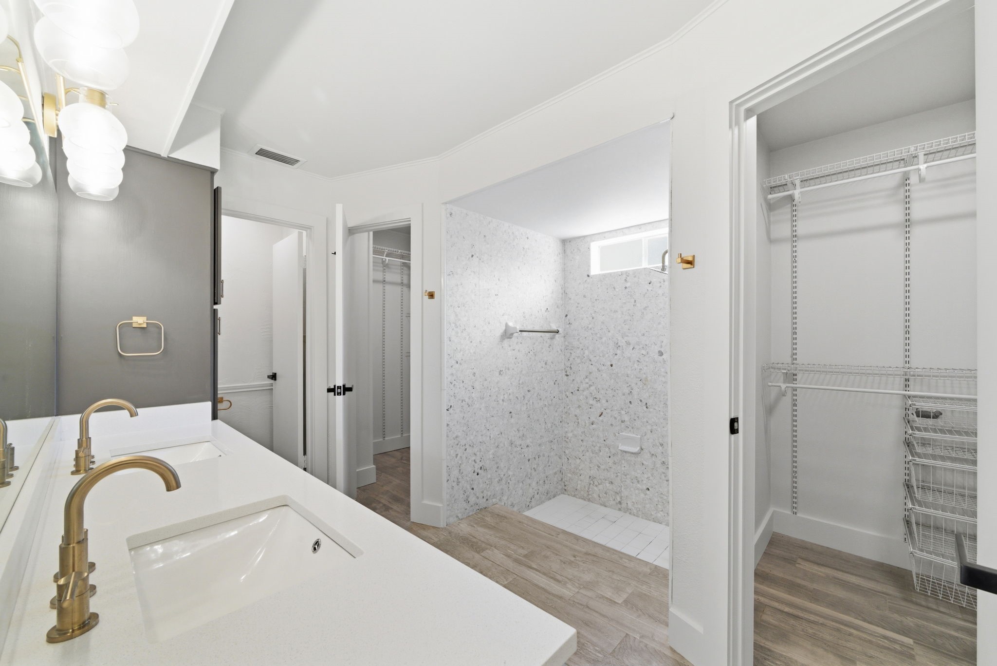 8131 Theisswood Road Spring, TX 77379 - Photo 20 of 31 Ensuite features double sinks and a walk-in closet