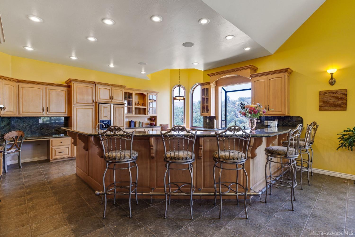 24500 Heather Court Tehachapi, CA 93561 - Photo 19 of 60 a view of a dining room with furniture