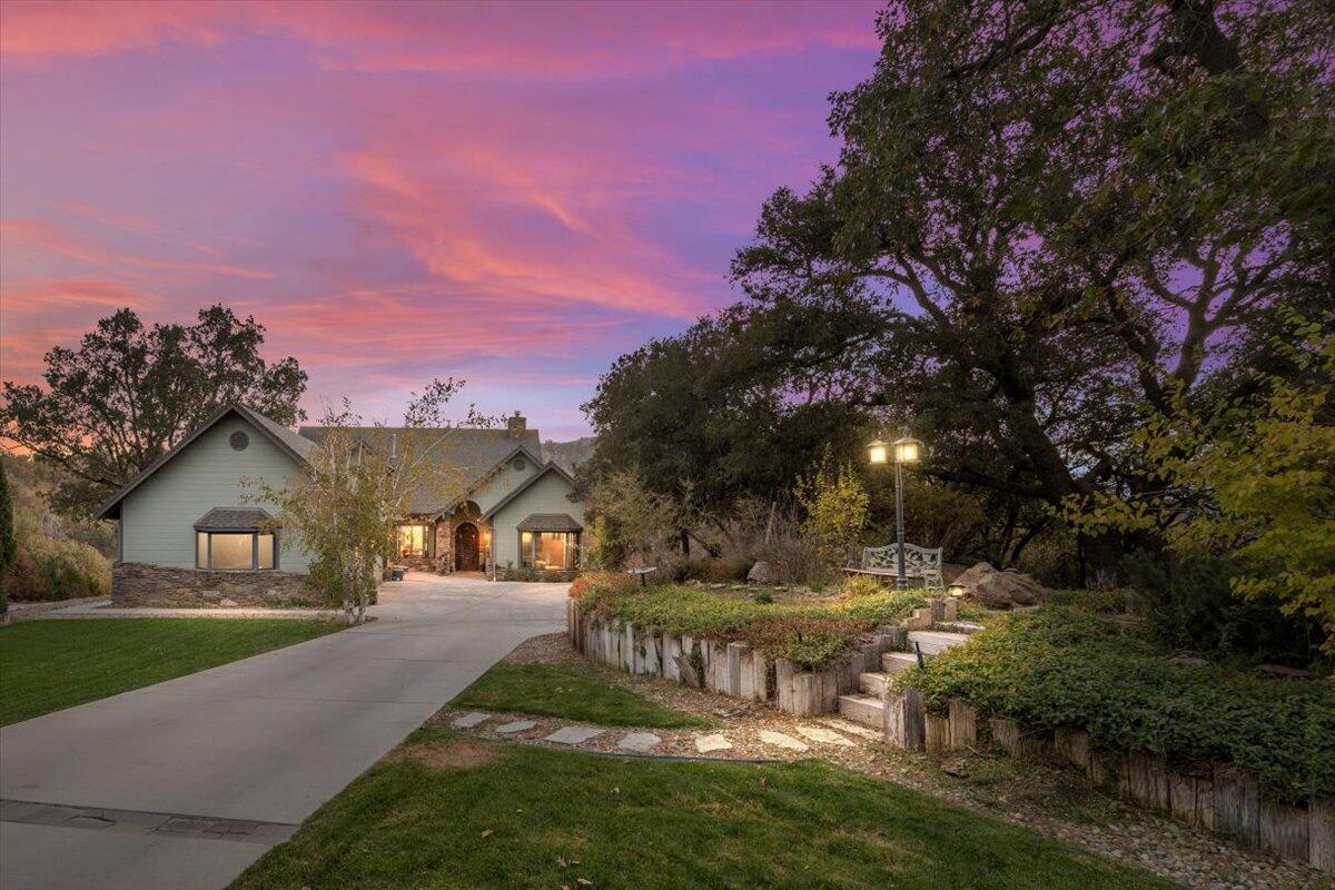 24500 Heather Court Tehachapi, CA 93561 - Photo 2 of 60 a view of house with outdoor space and sitting area