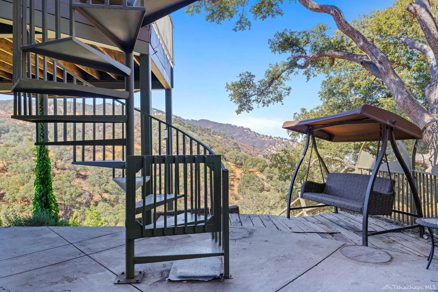 24500 Heather Court Tehachapi, CA 93561 - Photo 37 of 60 a view of a chairs and table in the balcony