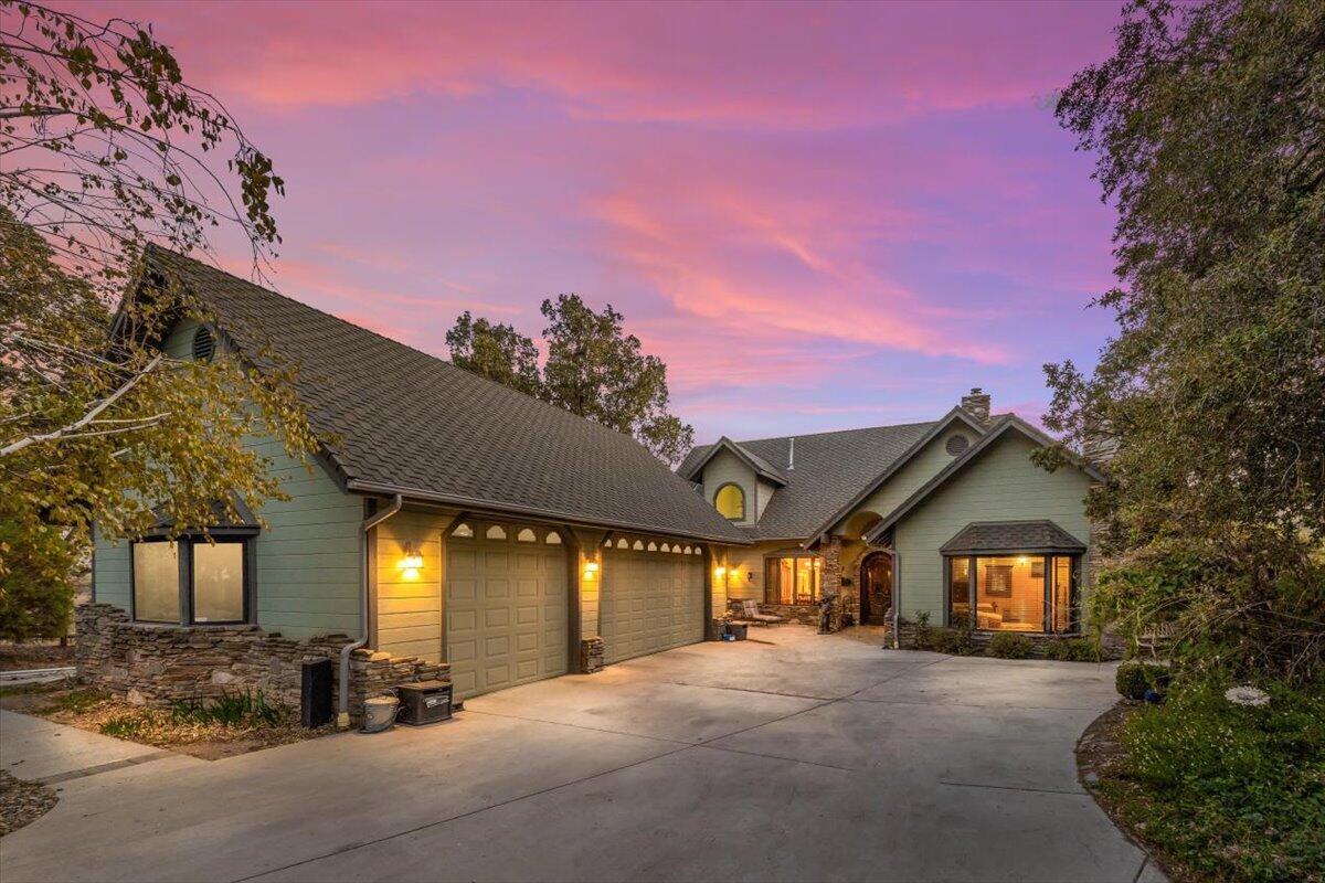 24500 Heather Court Tehachapi, CA 93561 - Photo 4 of 60 a view of a house with a yard and a large tree