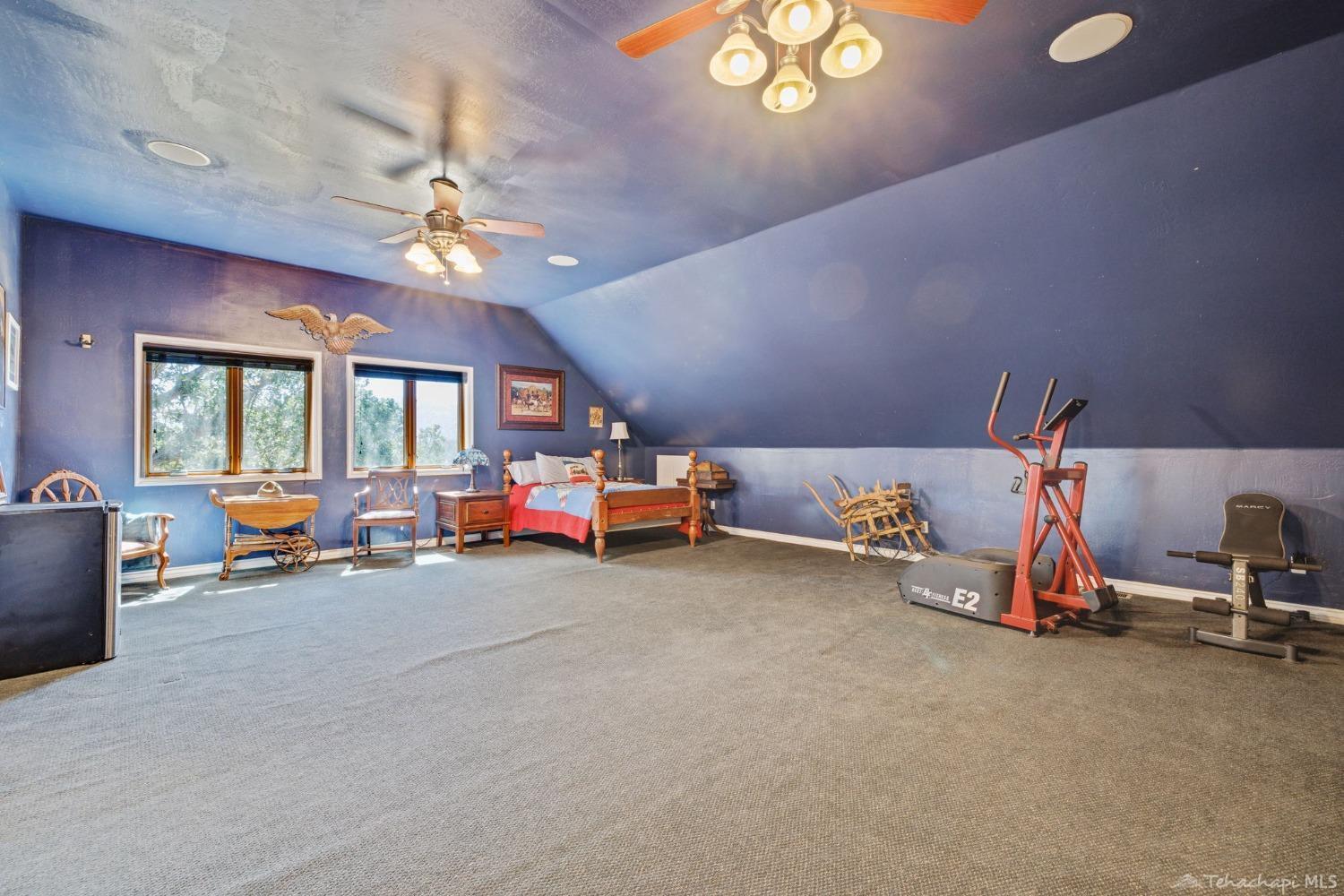 24500 Heather Court Tehachapi, CA 93561 - Photo 47 of 60 a view of a room with furniture and a chandelier