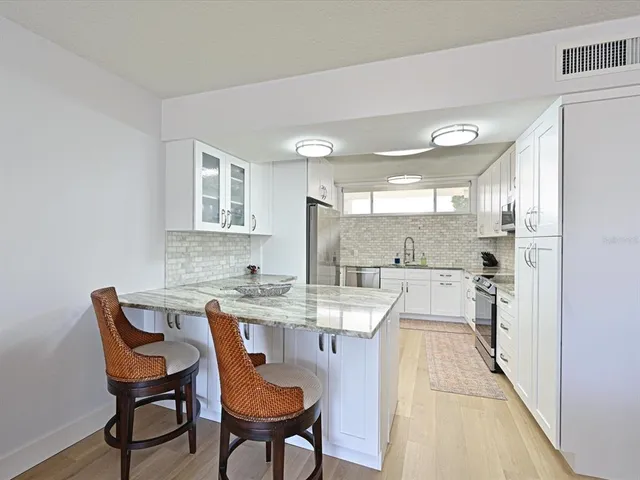 a view of a dining room with furniture