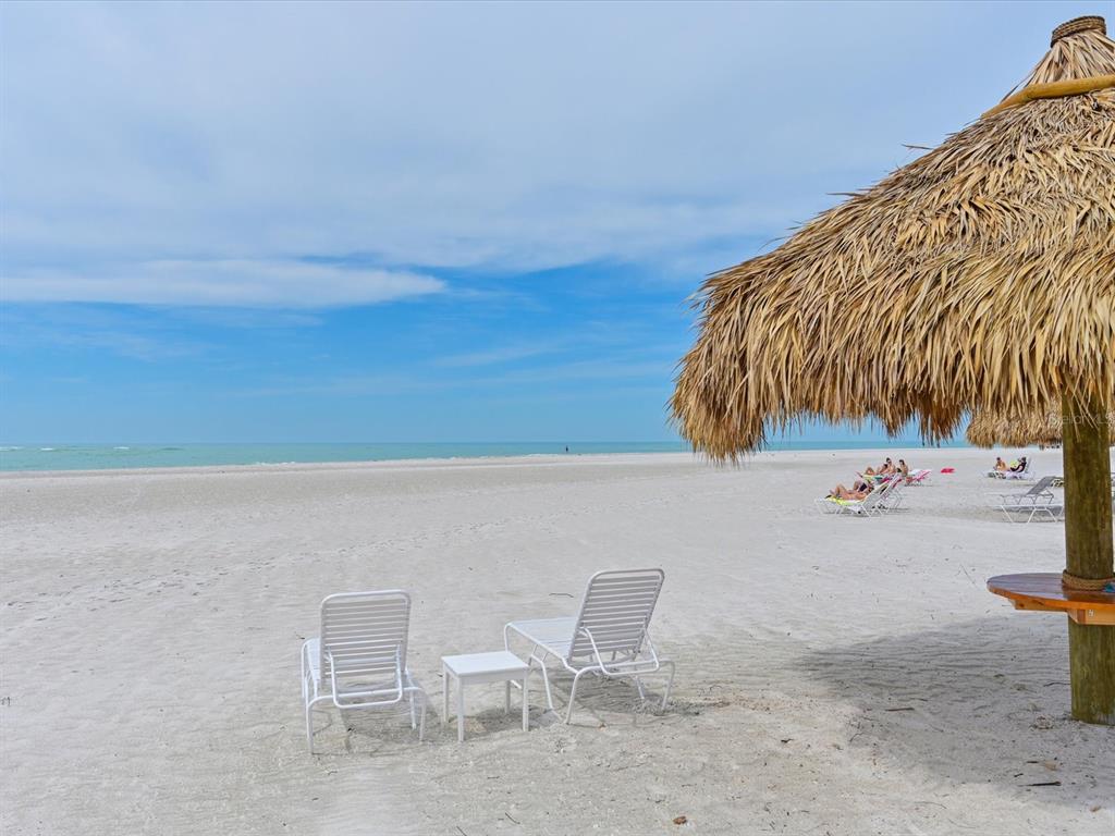 100 Sands Point Road, Unit 225 Longboat Key, FL 34228 - Photo 2 of 32 a view of outdoor space with seating area