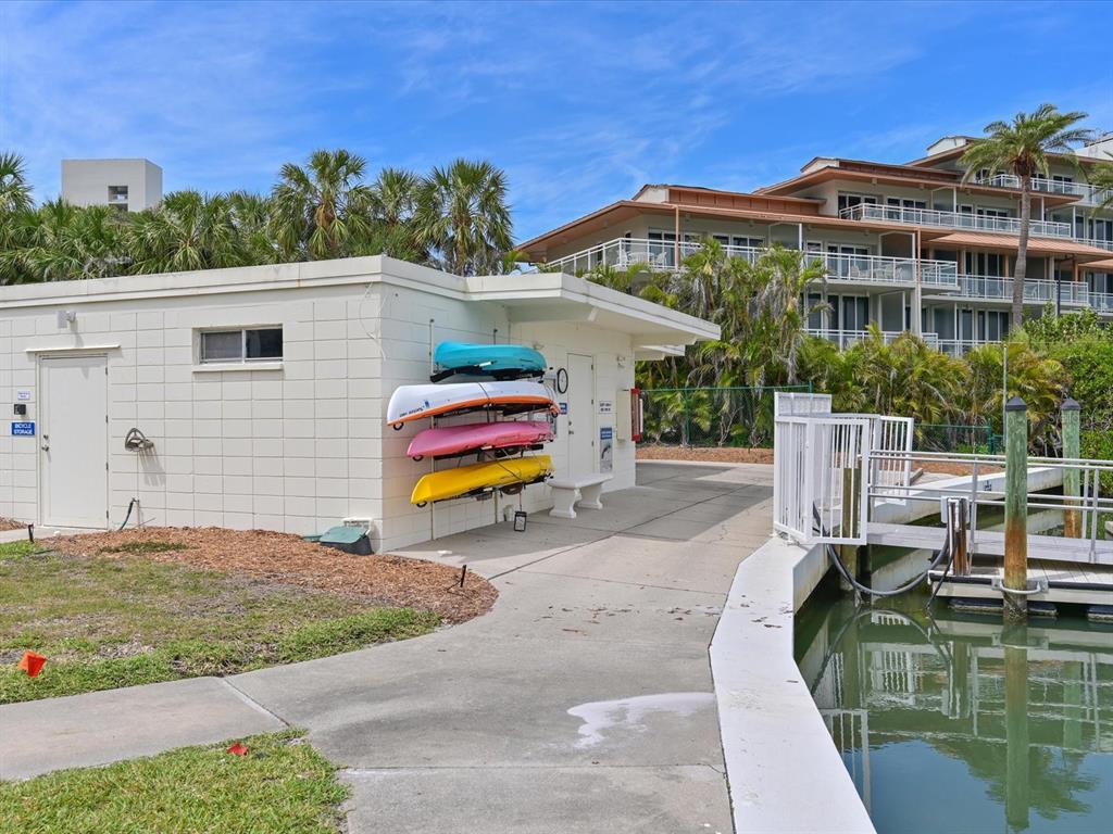 100 Sands Point Road, Unit 225 Longboat Key, FL 34228 - Photo 32 of 32 a view of a house with outdoor space