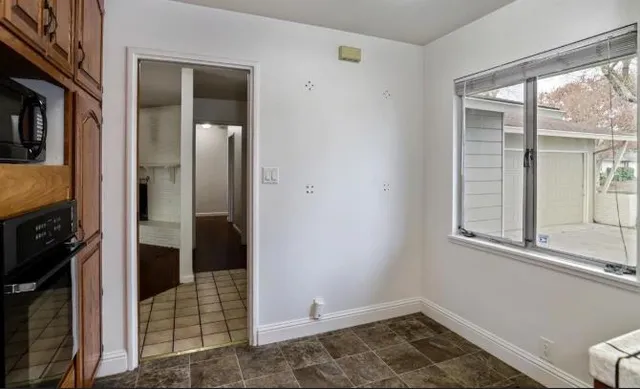 a view of a bathroom from a hallway