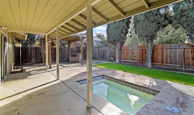 a house with garden in front of it