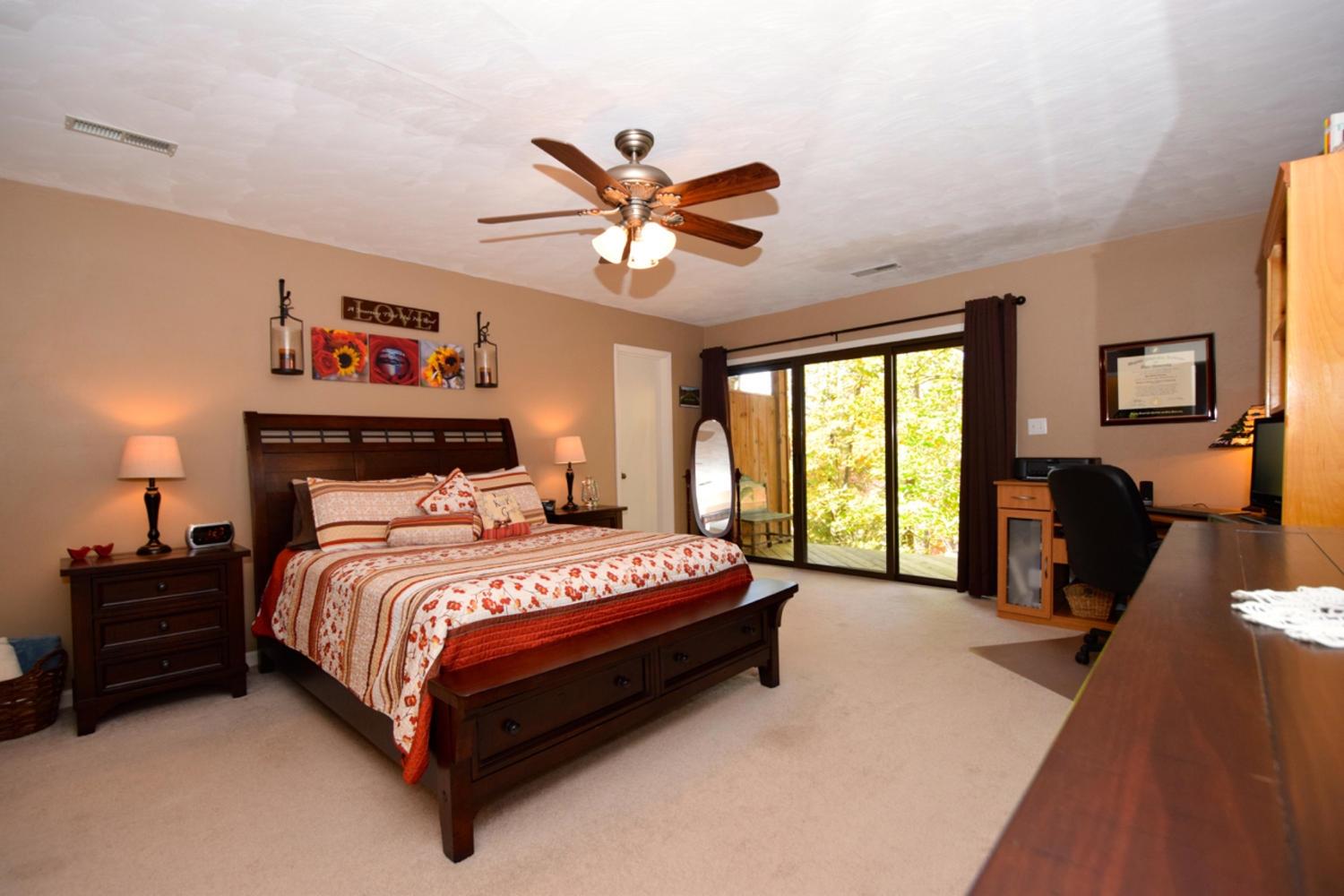 3323 Forest Ridge Road Roanoke, VA 24018 - Photo 14 of 23 a bedroom with a bed and a large window