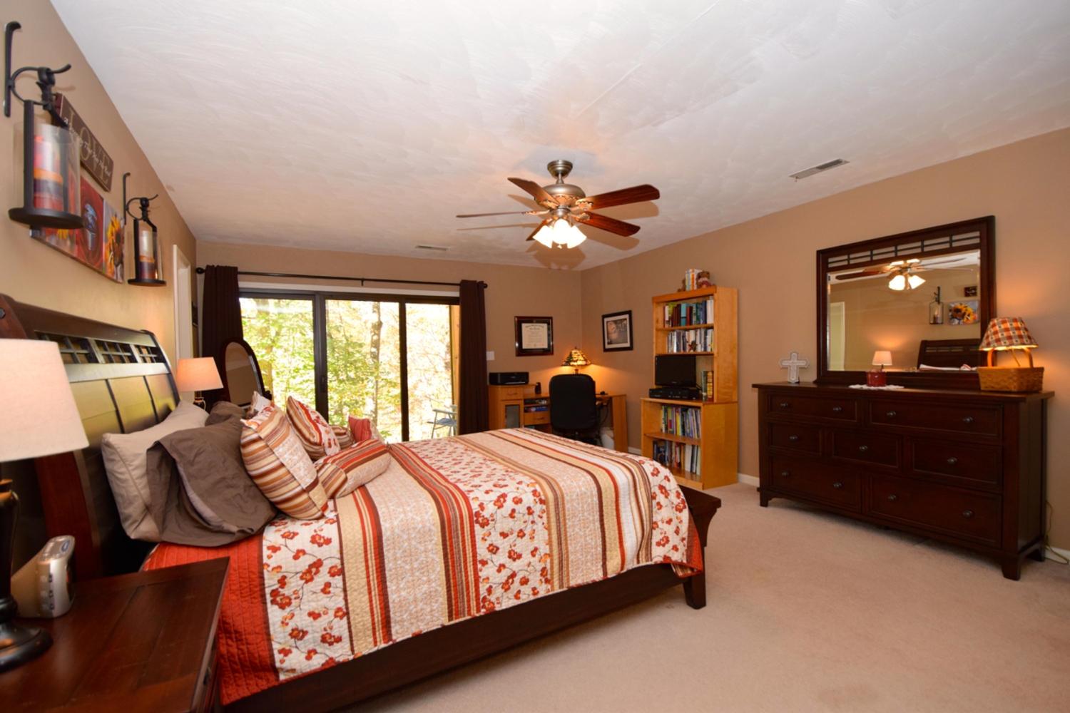 3323 Forest Ridge Road Roanoke, VA 24018 - Photo 16 of 23 a bedroom with a bed and a dresser