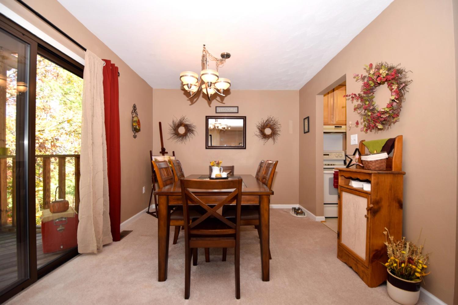 3323 Forest Ridge Road Roanoke, VA 24018 - Photo 5 of 23 a view of a dining room with furniture and chandelier