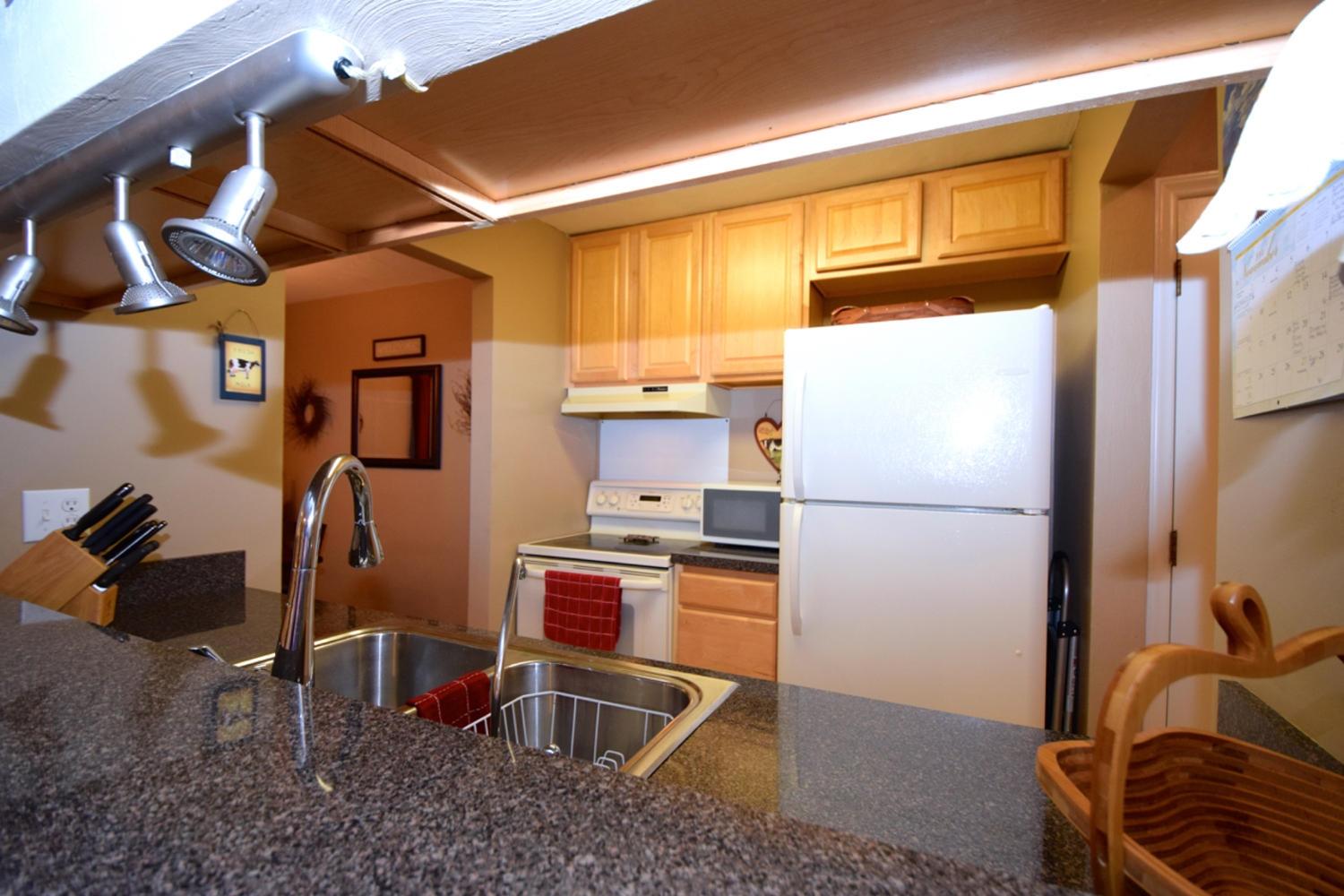 3323 Forest Ridge Road Roanoke, VA 24018 - Photo 7 of 23 a kitchen with stainless steel appliances a refrigerator and cabinets