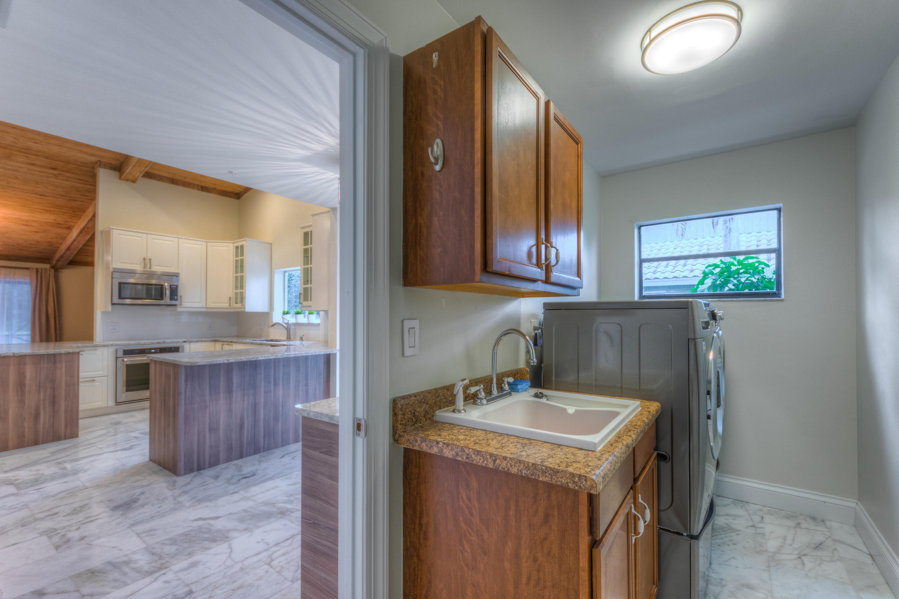 7672 Estrella Circle Boca Raton, FL 33433 - Photo 10 of 39 ESTANCIA LAUNDRY ROOM