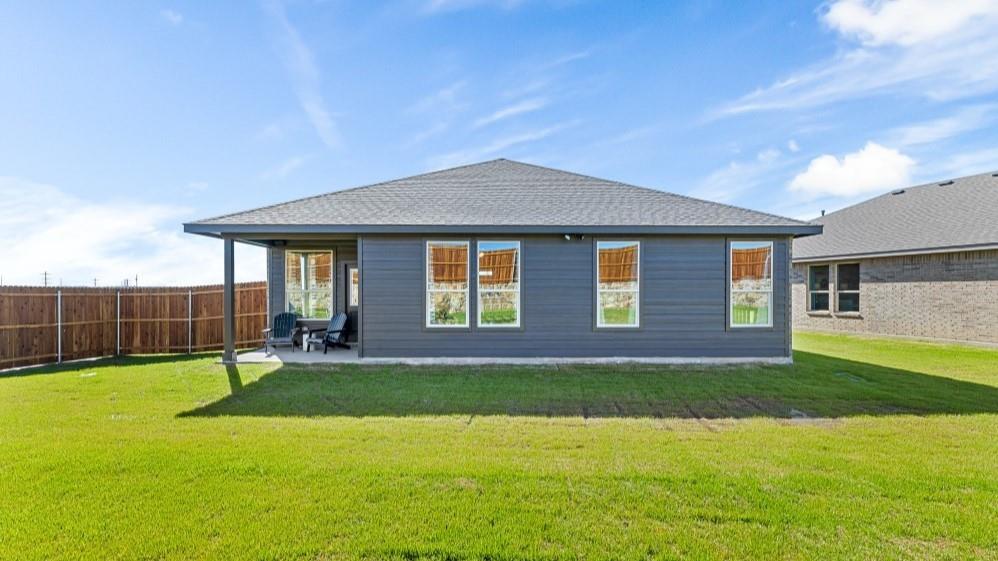 109 Hugo Court Rhome, TX 76078 - Photo 24 of 30 a view of a house with a yard and sitting area