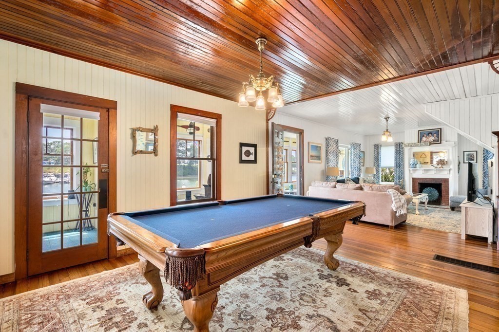 7 North Water Street Wareham, MA 02558 - Photo 11 of 39 a room with pool table and wooden floor