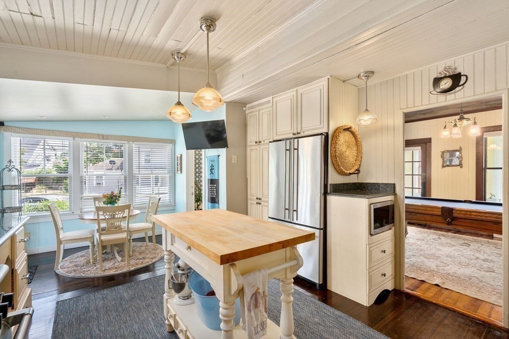 7 North Water Street Wareham, MA 02558 - Photo 14 of 39 a view of a dining room with furniture window and wooden floor