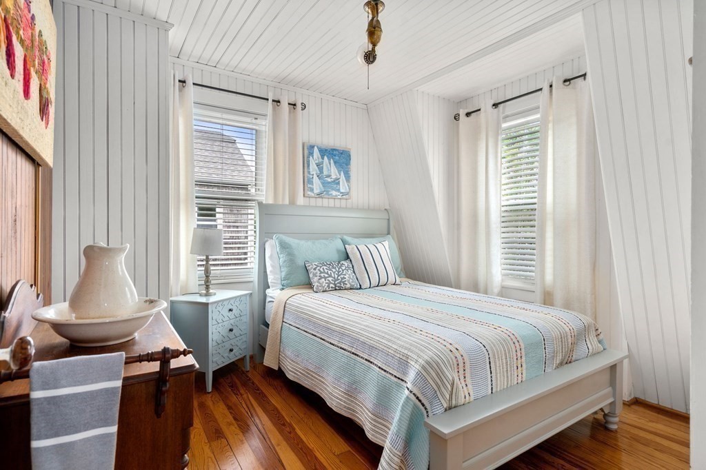 7 North Water Street Wareham, MA 02558 - Photo 21 of 39 a bedroom with a bed chair and a window