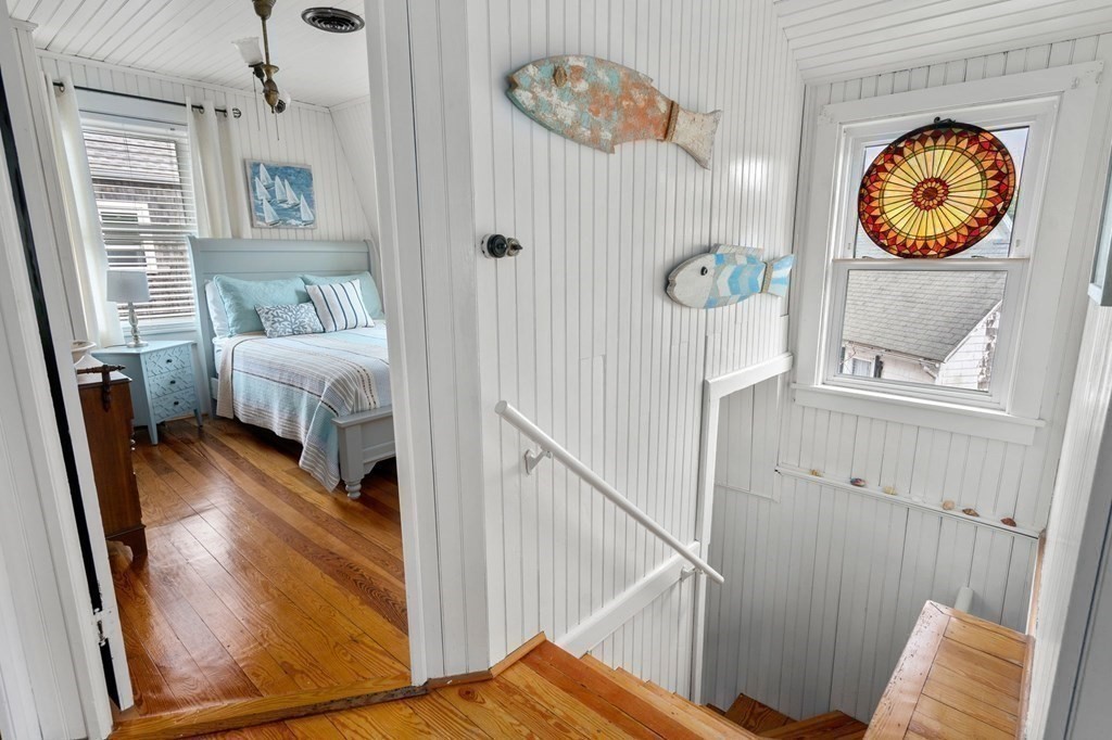 7 North Water Street Wareham, MA 02558 - Photo 26 of 39 a view of a hallway with wooden floor and windows