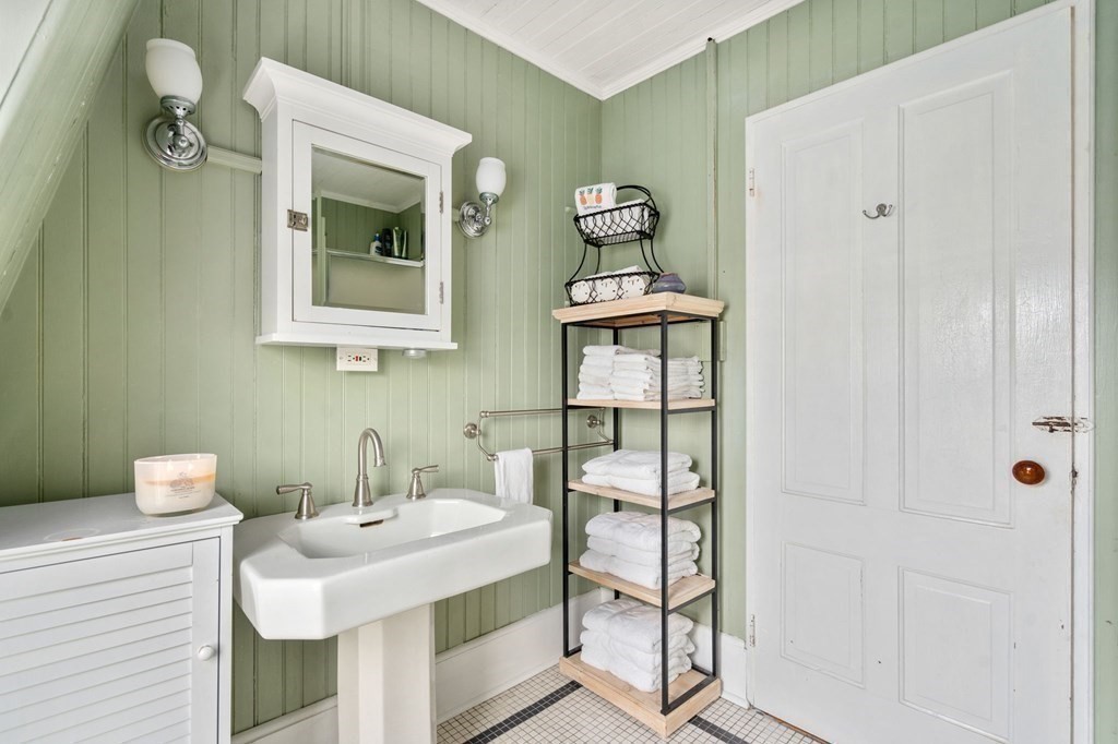 7 North Water Street Wareham, MA 02558 - Photo 27 of 39 a bathroom with a sink and mirror