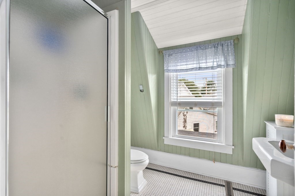 7 North Water Street Wareham, MA 02558 - Photo 28 of 39 a bathroom with a toilet a sink and a window