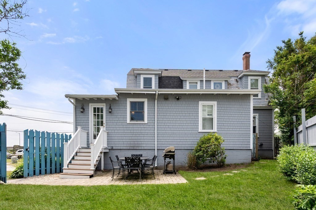7 North Water Street Wareham, MA 02558 - Photo 29 of 39 a front view of a house with a yard