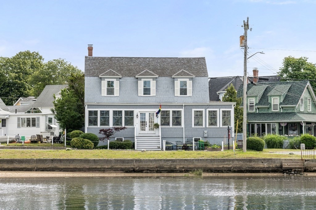 7 North Water Street Wareham, MA 02558 - Photo 32 of 39 a front view of a house with a lake view and lake view