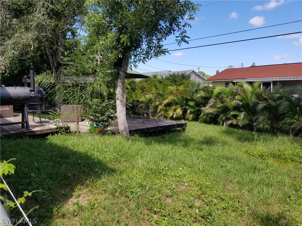 8201 Sandpiper Road Fort Myers, FL 33967 - Photo 2 of 11 a view of a garden with a patio
