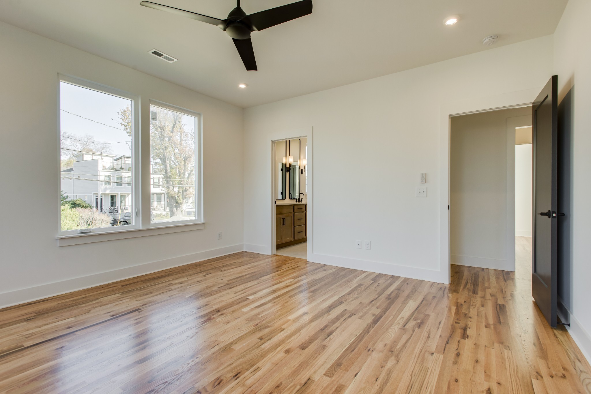 505 Croley Drive Nashville, TN 37209 - Photo 21 of 38 a view of empty room with wooden floor and fan