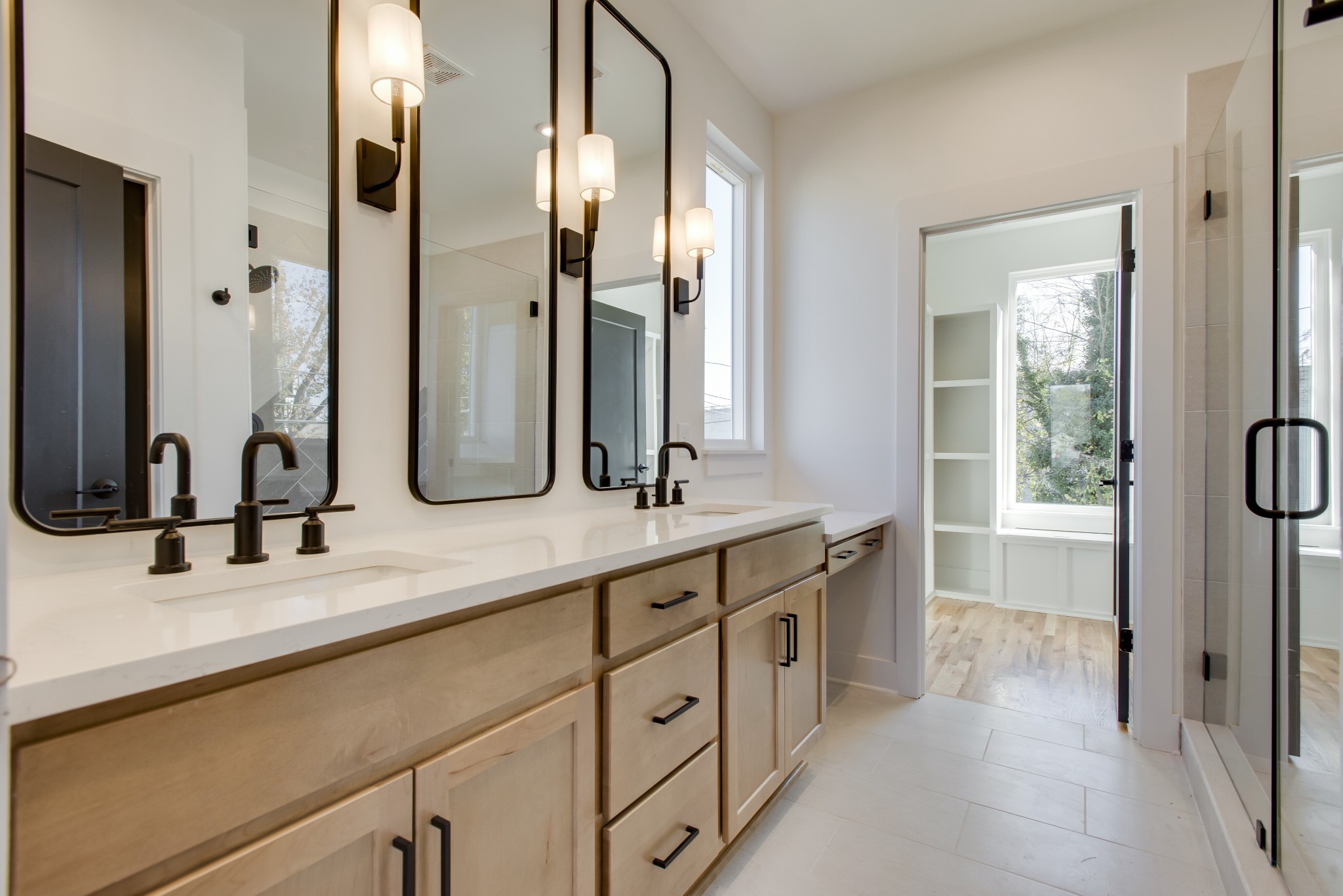 505 Croley Drive Nashville, TN 37209 - Photo 22 of 38 a bathroom with double vanity sinks and a mirror