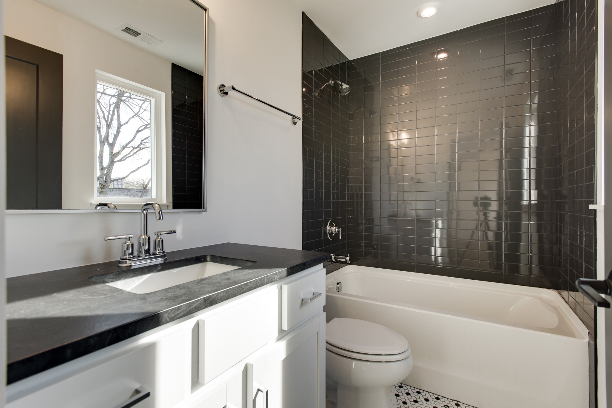 505 Croley Drive Nashville, TN 37209 - Photo 31 of 38 a bathroom with a granite countertop sink a toilet and bathtub