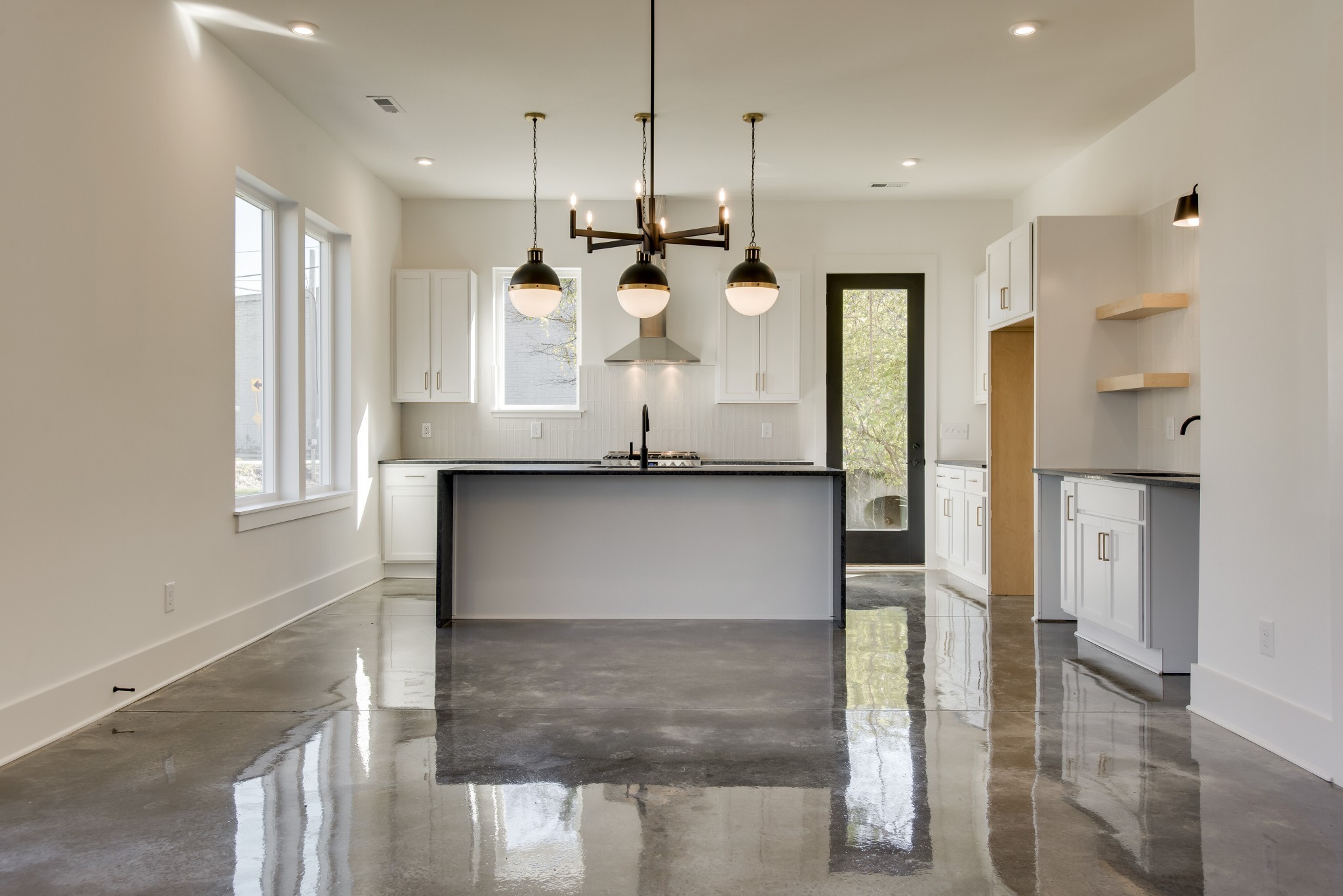 505 Croley Drive Nashville, TN 37209 - Photo 8 of 38 a kitchen with a refrigerator and countertop cabinets