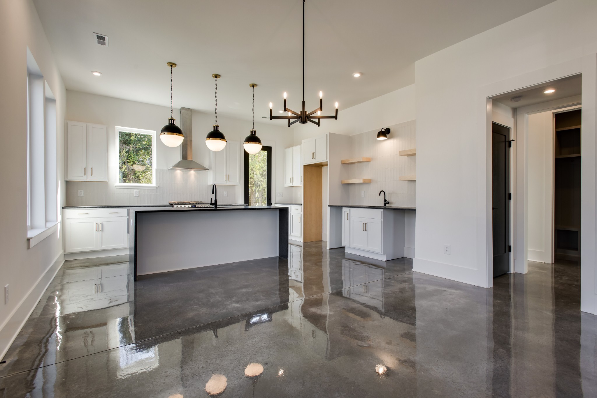 505 Croley Drive Nashville, TN 37209 - Photo 9 of 38 a view of a kitchen with a refrigerator a sink and a window