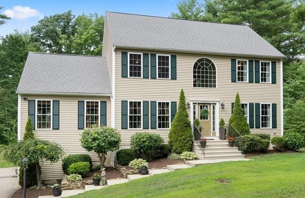 253 Walker Road Sturbridge, MA 01566 - Photo 1 of 31 a front view of a house with a yard