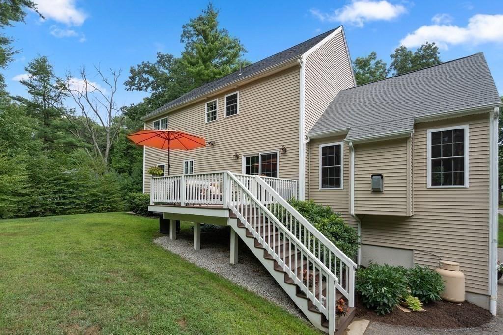 253 Walker Road Sturbridge, MA 01566 - Photo 30 of 31 a view of a house with backyard and garden