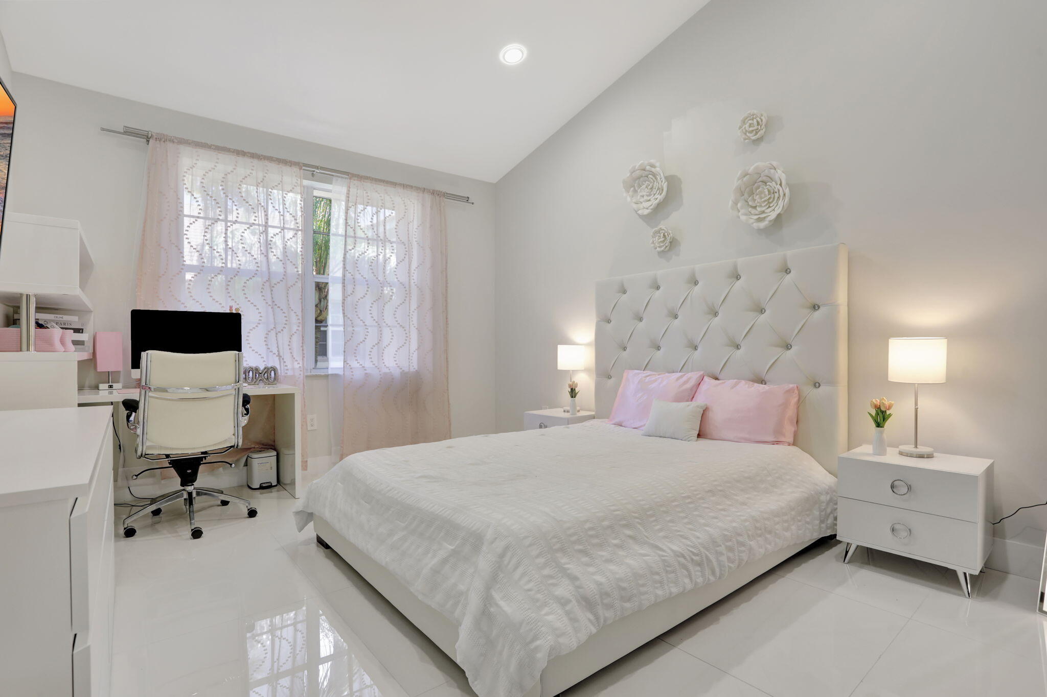 6584 Villa Sonrisa Drive, Unit 1122 Boca Raton, FL 33433 - Photo 17 of 22 a bedroom with a bed and large window