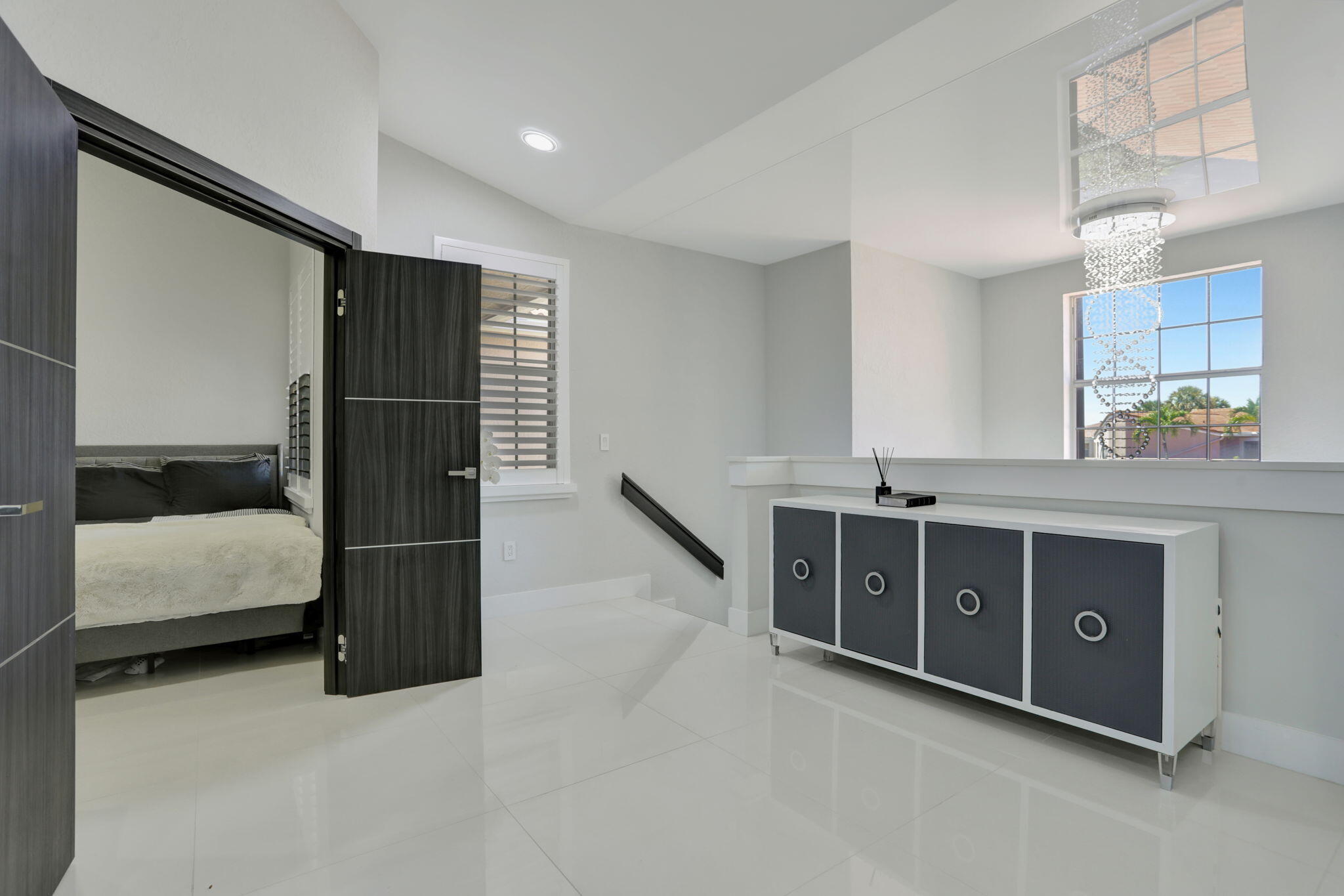 6584 Villa Sonrisa Drive, Unit 1122 Boca Raton, FL 33433 - Photo 4 of 22 a spacious bathroom with a double vanity sink and a mirror