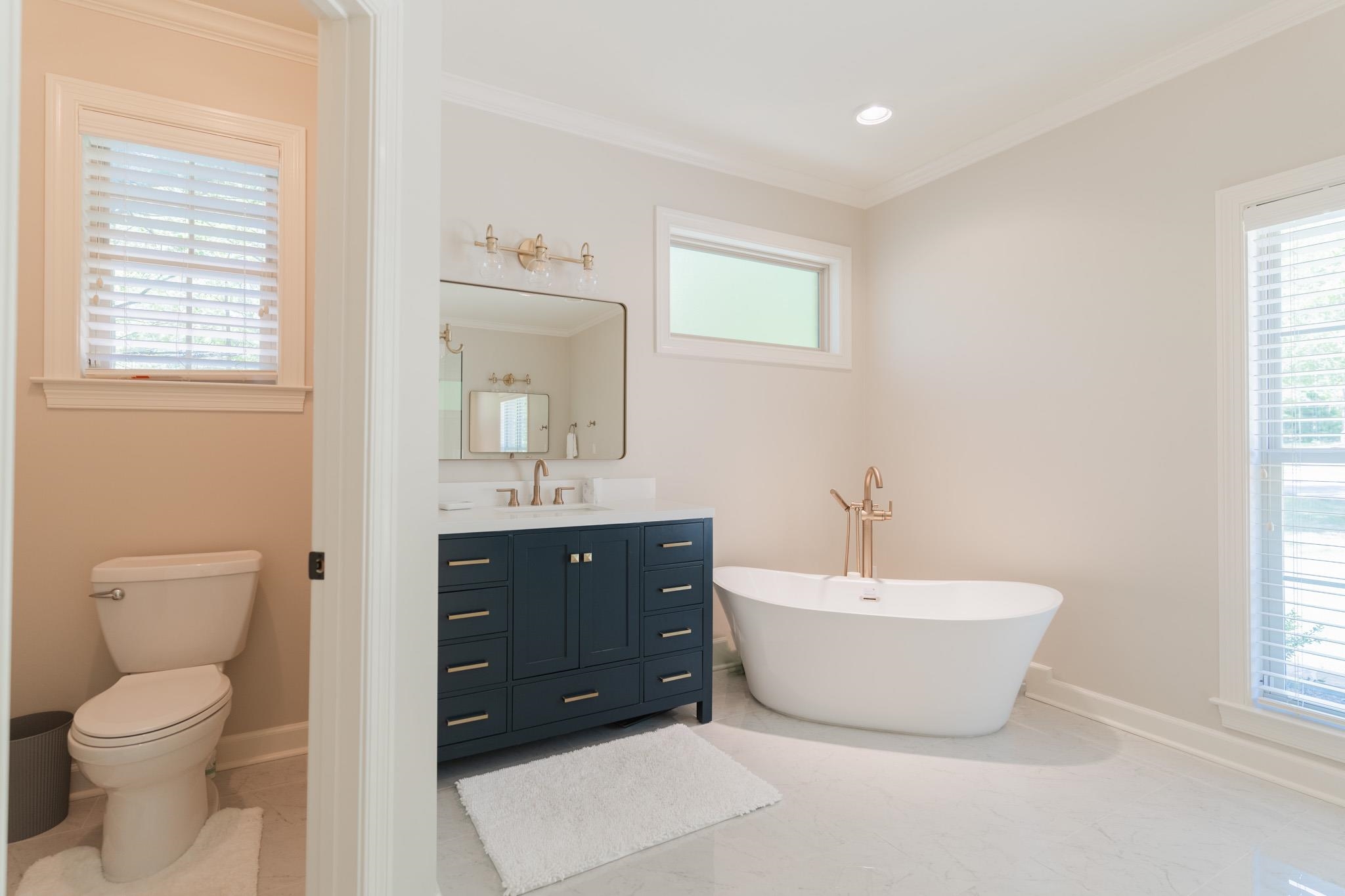 12035 Raleigh Lagrange Road East Eads, TN 38028 - Photo 19 of 37 His & Her Vanities, Toilet Room, & Soaking Tub