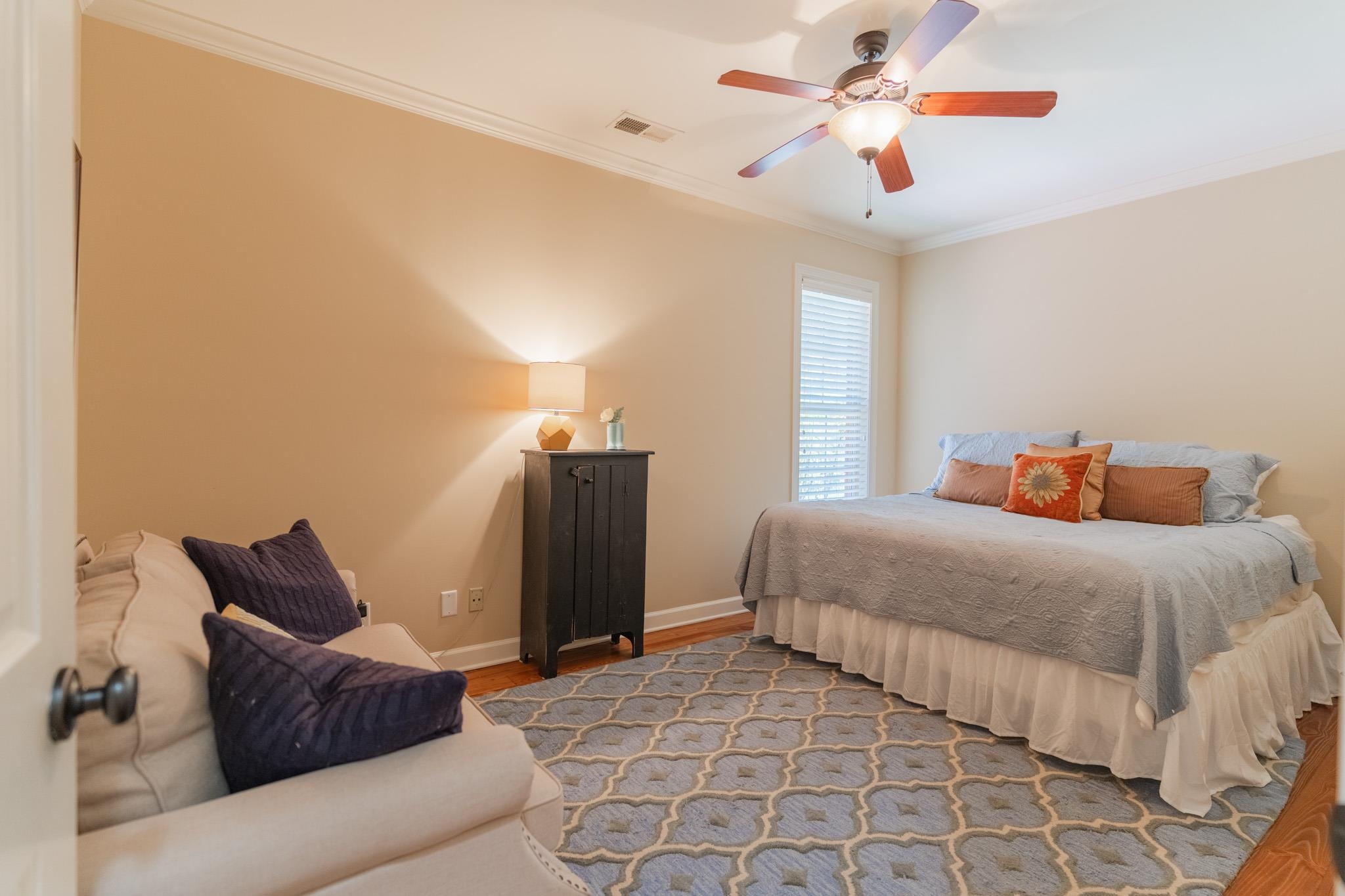 12035 Raleigh Lagrange Road East Eads, TN 38028 - Photo 20 of 37 This second downstairs bedroom is off the back hallway on the opposite side of the house from the primary.