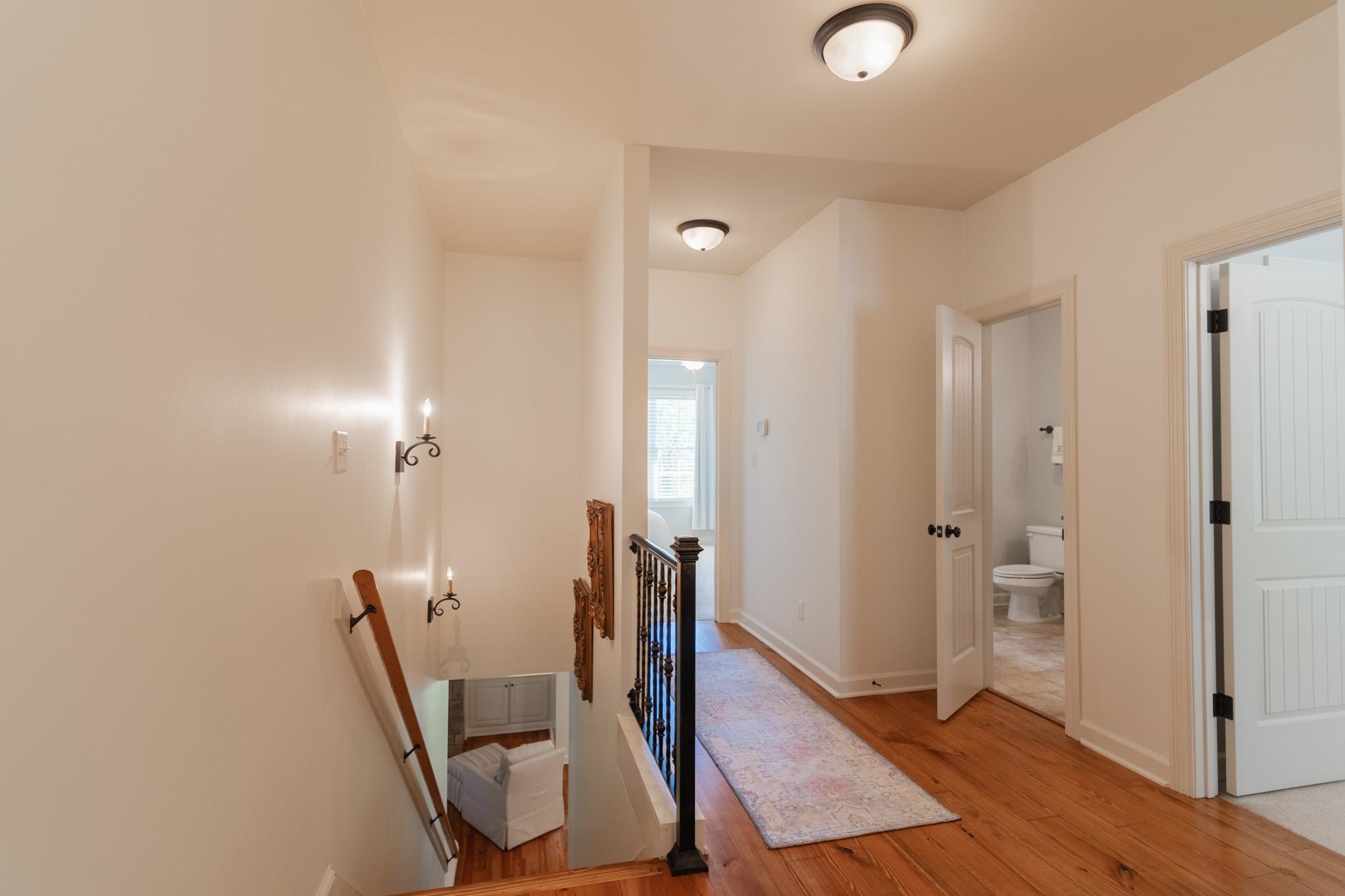 12035 Raleigh Lagrange Road East Eads, TN 38028 - Photo 24 of 37 Pretty landing with heart pine floors! Large Linen Closet