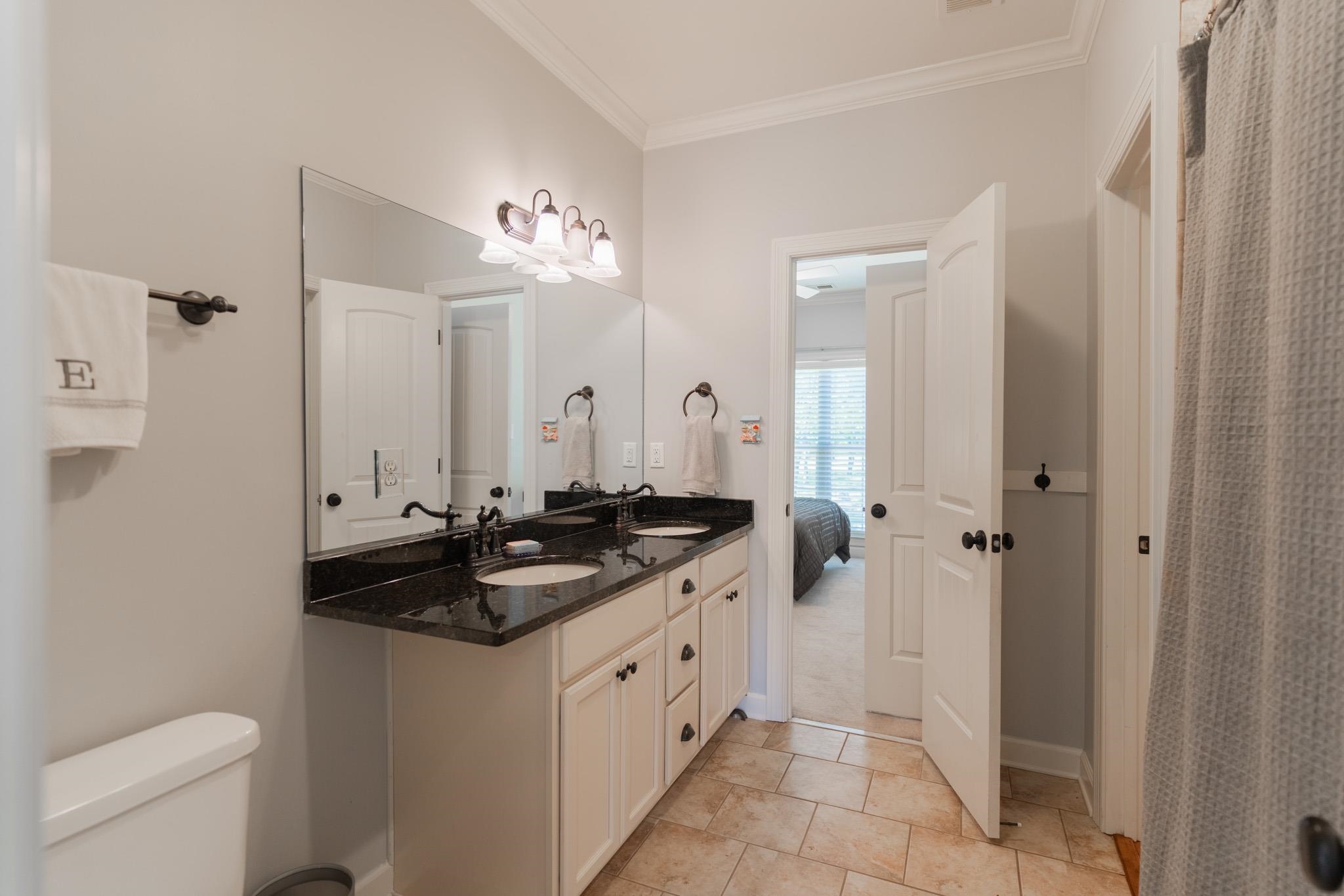 12035 Raleigh Lagrange Road East Eads, TN 38028 - Photo 28 of 37 Nicely Updated Jack n Jill bathroom between the 2 upstairs bathrooms & has a hall entry as well! Double Vanity, Shower/Tub Combo & Tile Floor.