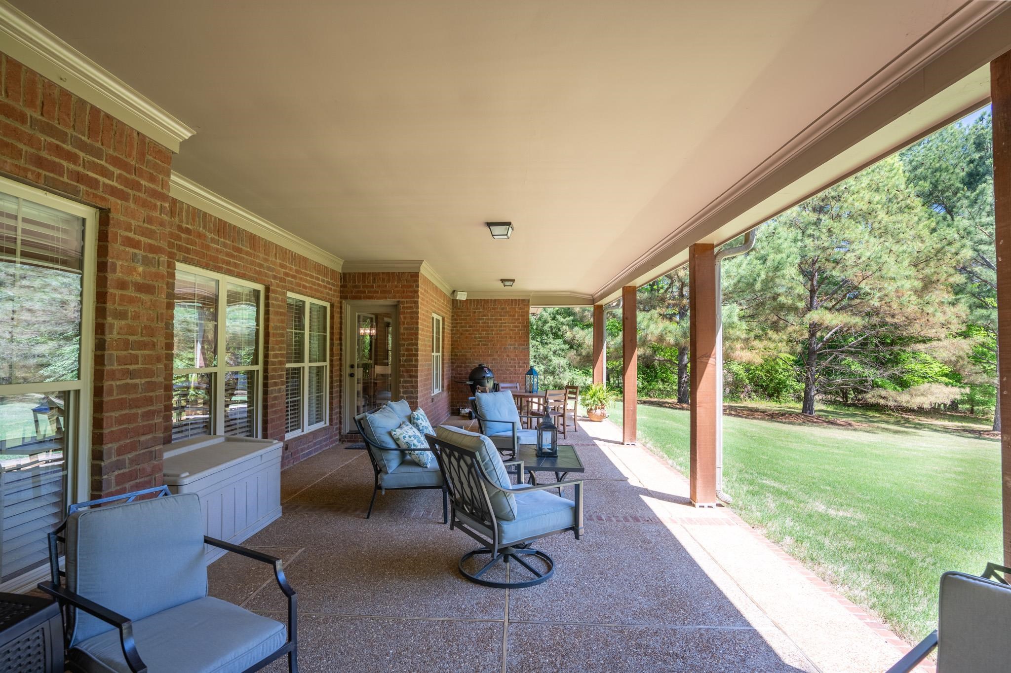 12035 Raleigh Lagrange Road East Eads, TN 38028 - Photo 30 of 37 This might be your favorite spot of the house to enjoy the gorgeous property! You have plenty of room for entertaining and enjoying your view! The built in speakers are on the porch too!